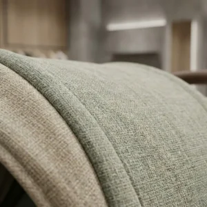 Premium sage green linen fabric detail illustrating 2026 wholesale baby stroller trends.