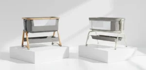 Bedside Sleeper Safety Standards comparison: Left EU model with barrier vs Right US model with flush fit.