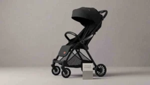 Premium stroller sourcing: Full profile of the matte black Babylovi ST523 with stitched leather handle.