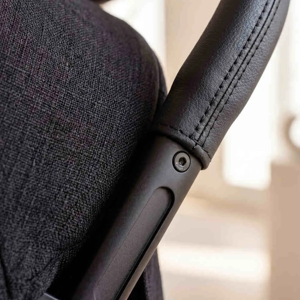 Premium stroller sourcing detail: Close-up of ST523 matte aluminum frame, 300D fabric, and leather handle.
